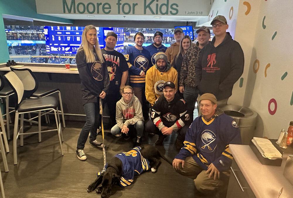 A night with the Buffalo Sabres dog Audi as she meets Veterans and teammates from the Buffalo Bandits